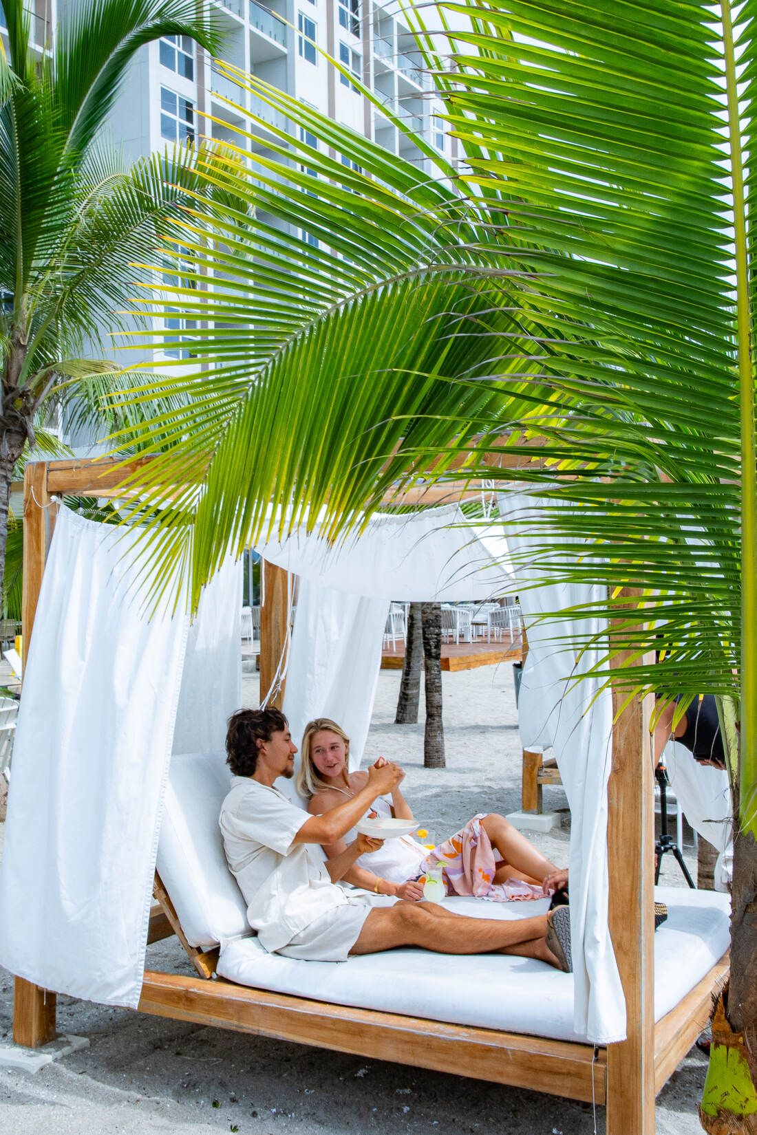 Lifestyle scene at a Playa Caracol beachfront cabana